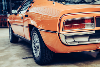 Rear View Of Orange Sports Car